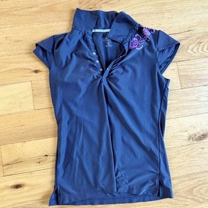 Athleta Med golf shirt medium purple design on back